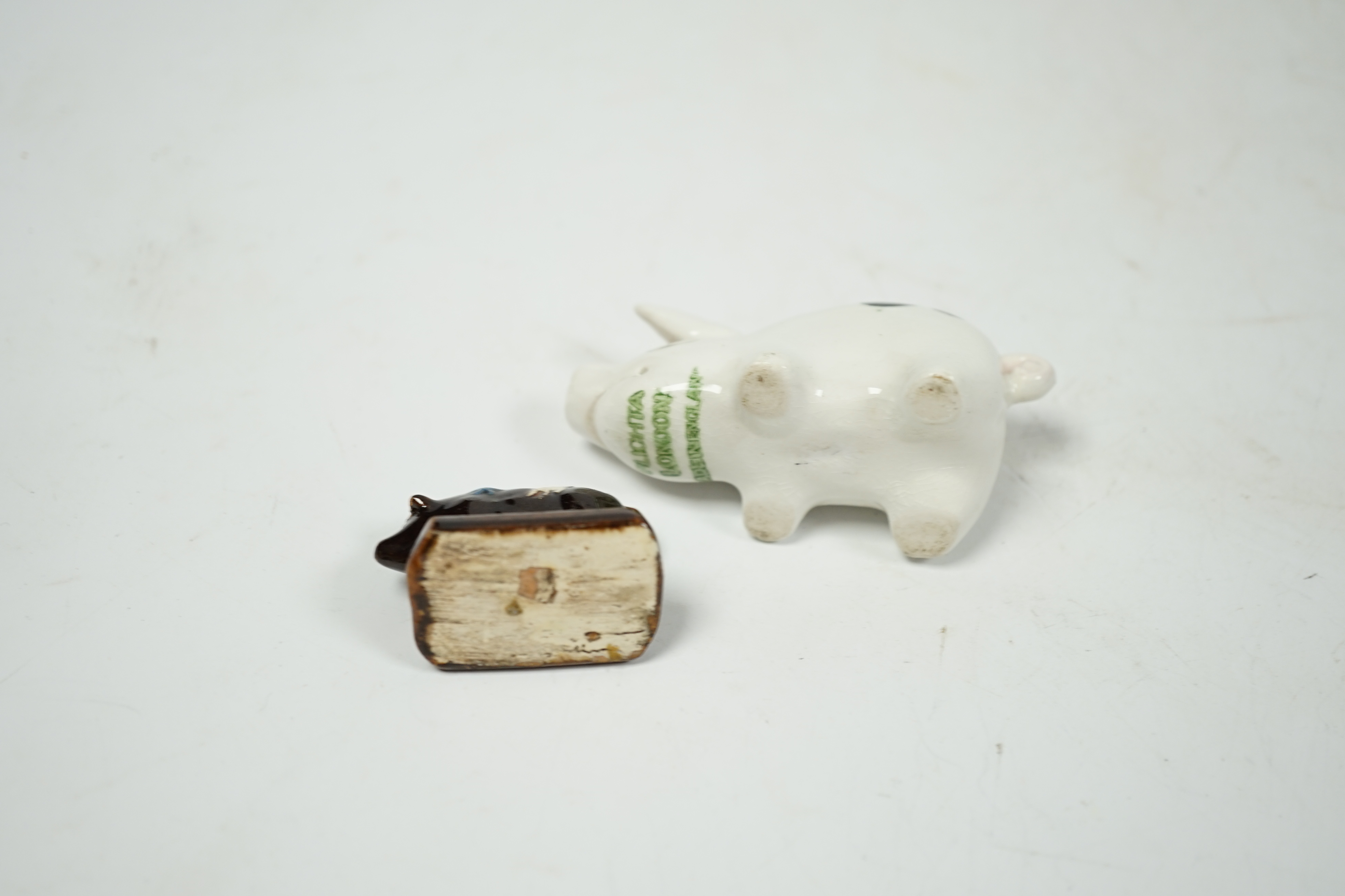 A miniature Plichta pig and a very miniature Slipware pig, Plichta pig 8cm long